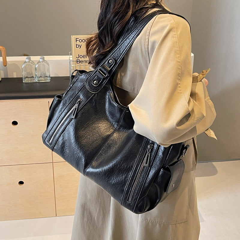 Dakota Dame Crossbody Taske – Elegant Lædertaske med Justerbar Rem & Rummeligt Design