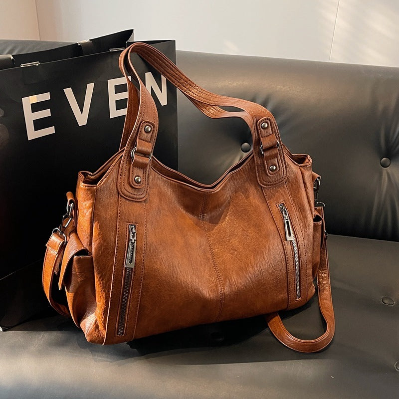Dakota Dame Crossbody Taske – Elegant Lædertaske med Justerbar Rem & Rummeligt Design