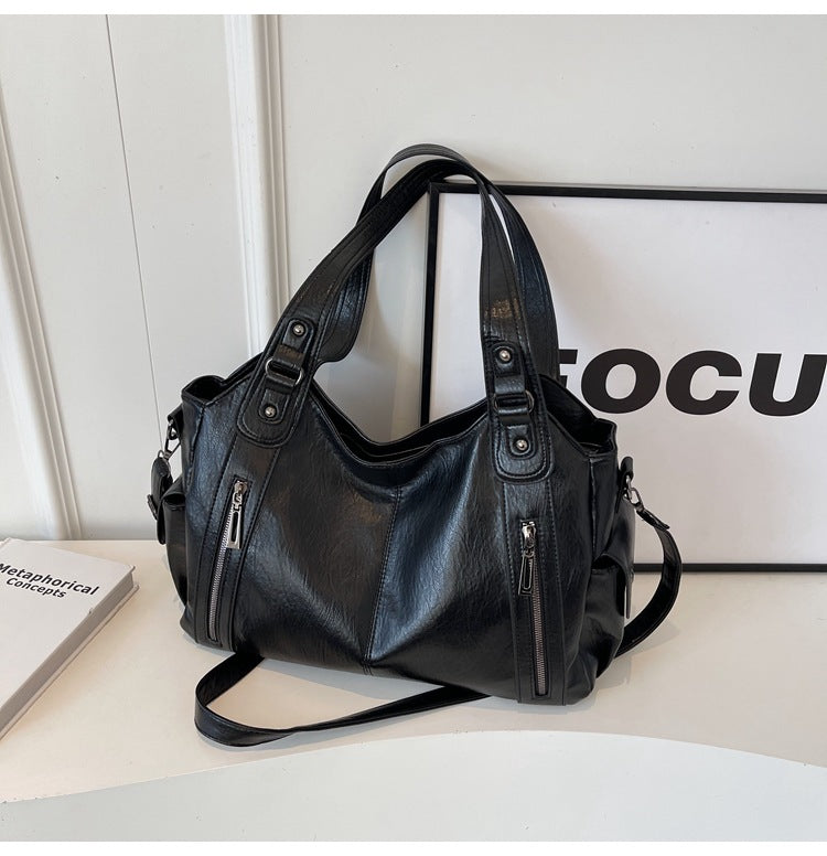 Dakota Dame Crossbody Taske – Elegant Lædertaske med Justerbar Rem & Rummeligt Design