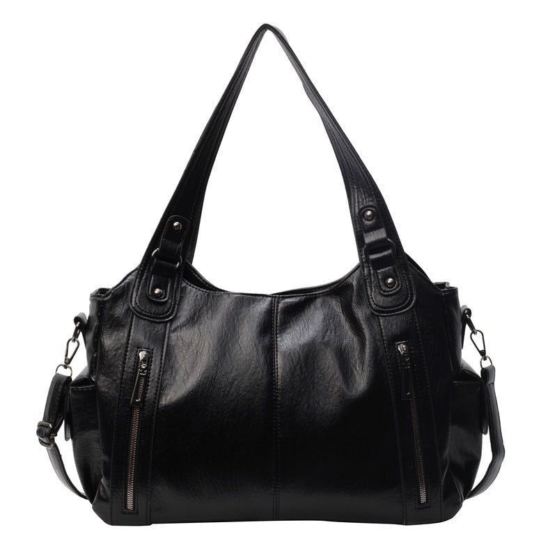 Dakota Dame Crossbody Taske – Elegant Lædertaske med Justerbar Rem & Rummeligt Design