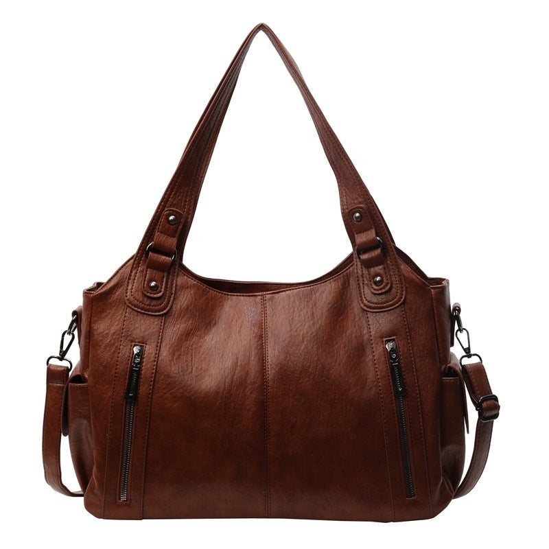 Dakota Dame Crossbody Taske – Elegant Lædertaske med Justerbar Rem & Rummeligt Design