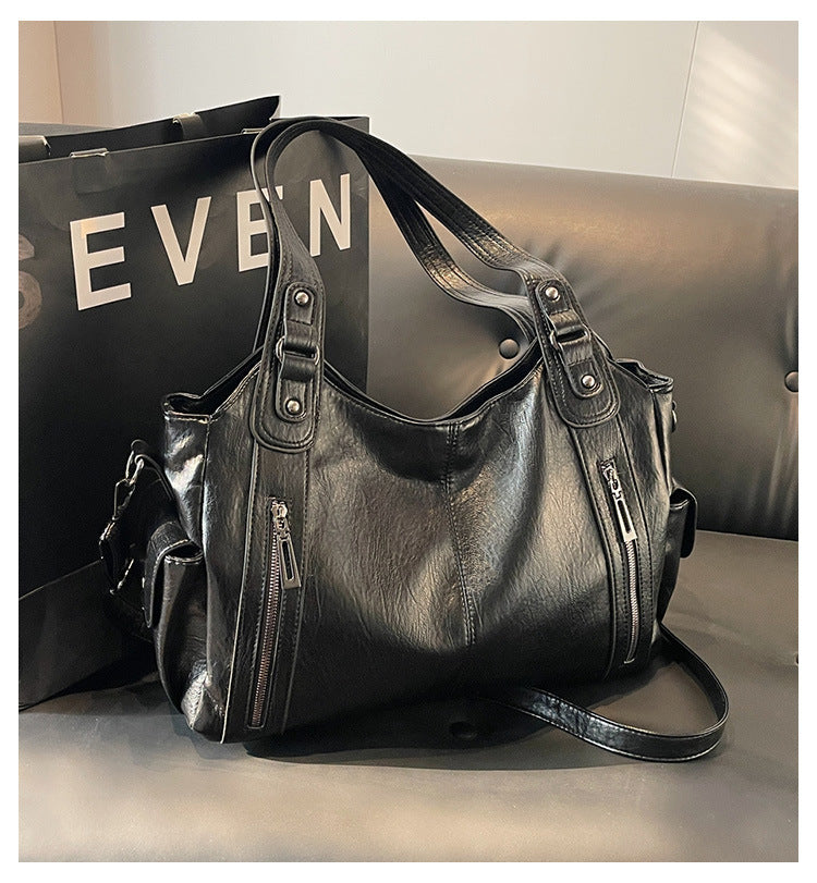 Dakota Dame Crossbody Taske – Elegant Lædertaske med Justerbar Rem & Rummeligt Design